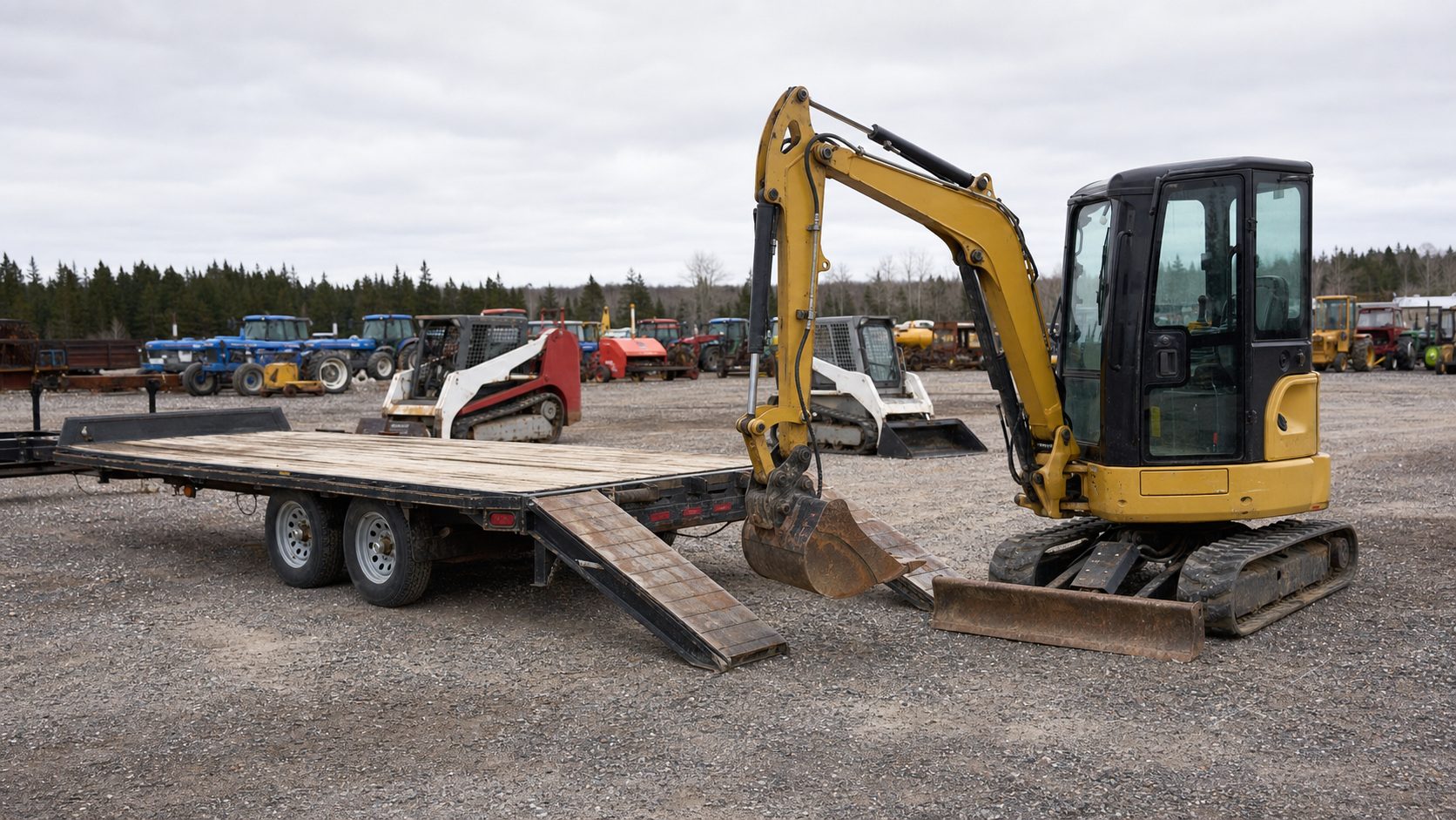 Equipment details and attachments that affect trailer fit and loading for auction pickup transport planning.